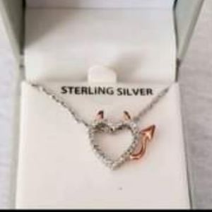 Sterling silver and rose gold plated devil pendant with diamonds